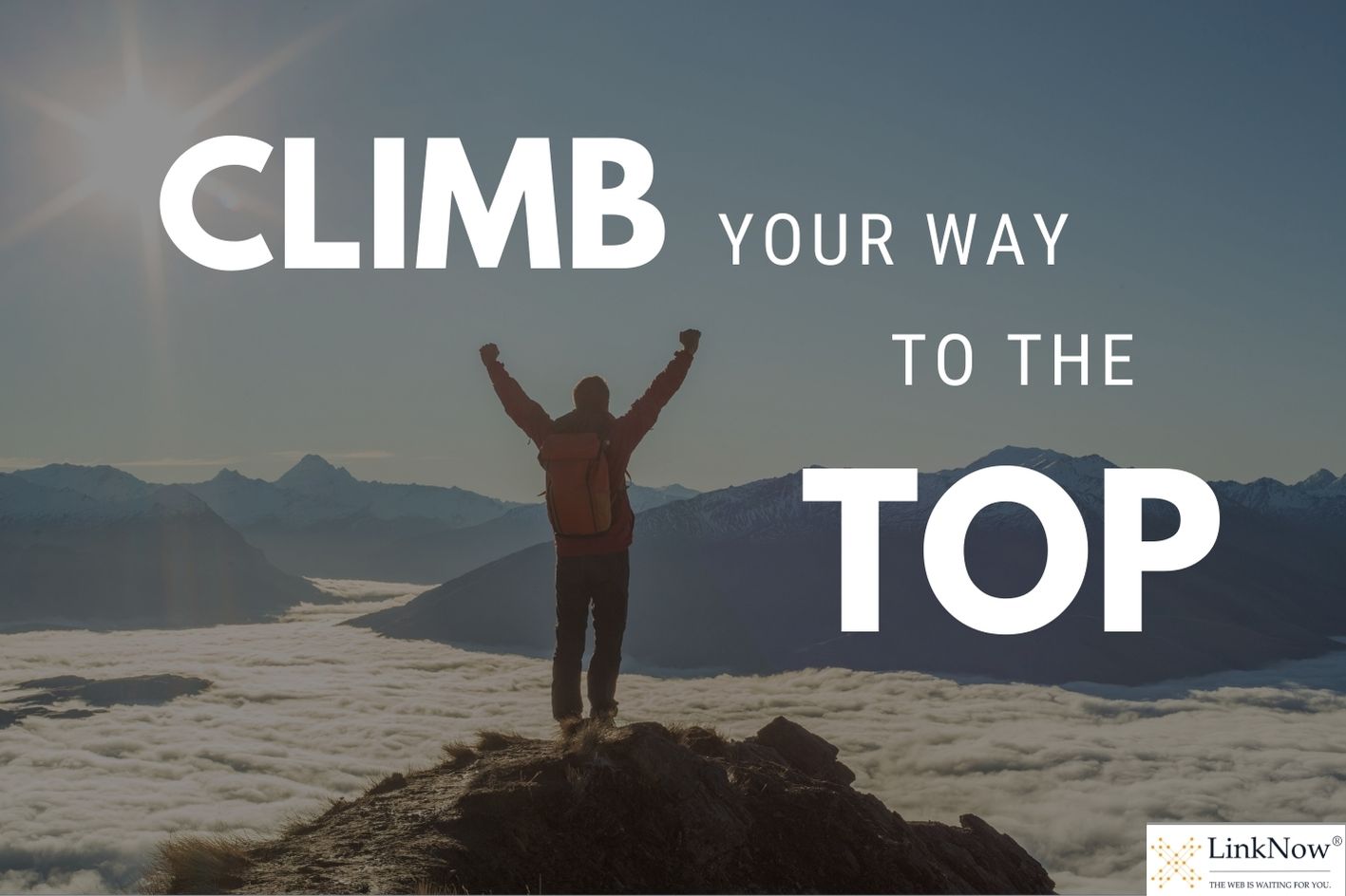 A person stands at the summit of a mountain with their arms raised in celebration. Text says: "Climb your way to the top."